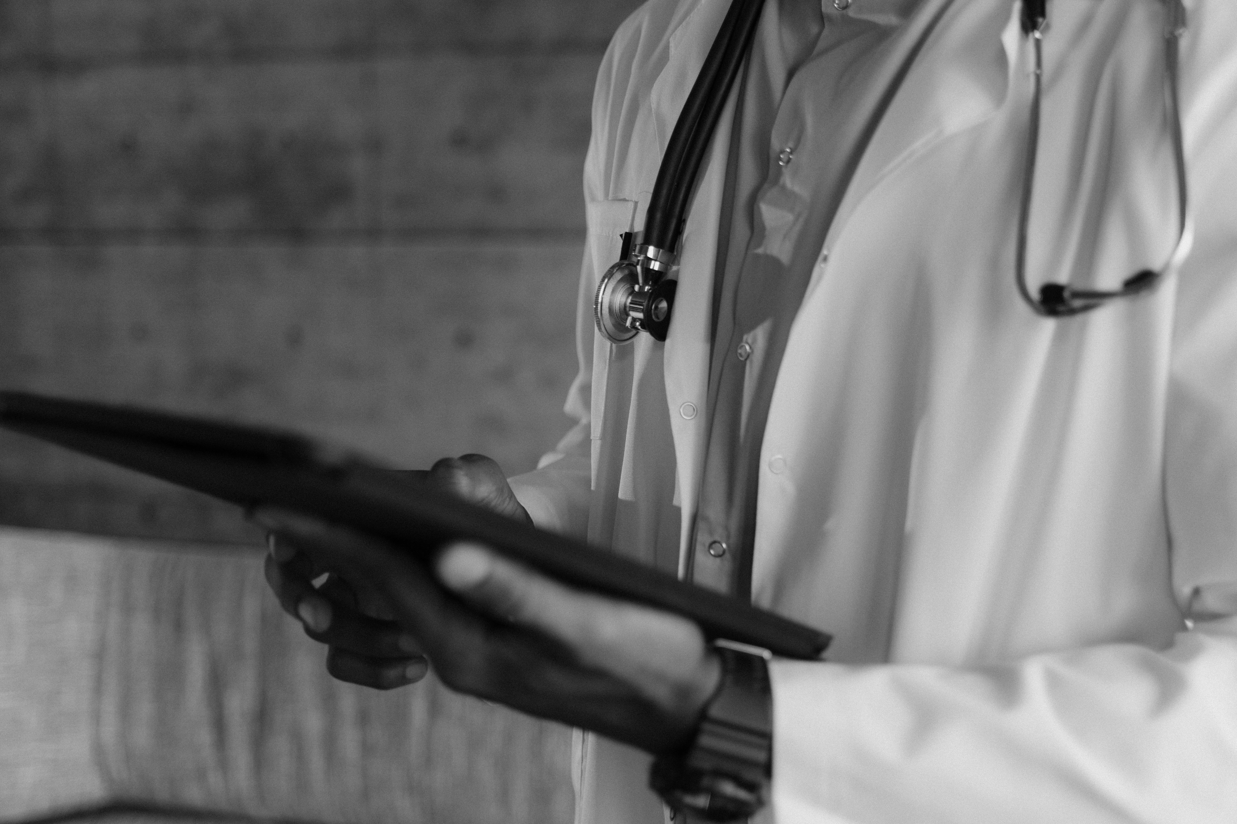 Doctor consulting with patient